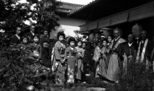 Family in garden, all in ceremonial dress. Two days entertainment in home of Mr. G. Tsukamoto. © The Field Museum, CSA50285.