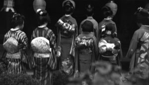 Back view of young ladies and maids [dressed in kimonos] of the household, showing different styles of tying obi and of dressing hair. Two days entertainment in home of Mr. G. Tsukamoto. © The Field Museum, CSA50291